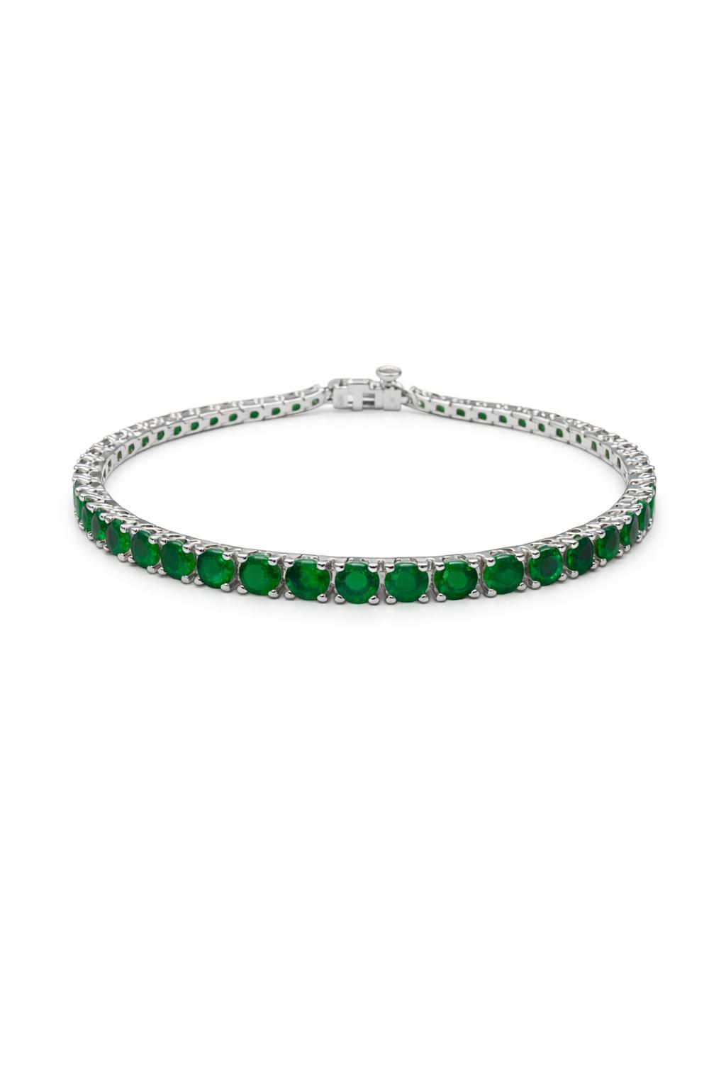 Shown in 14K White Gold with Emerald