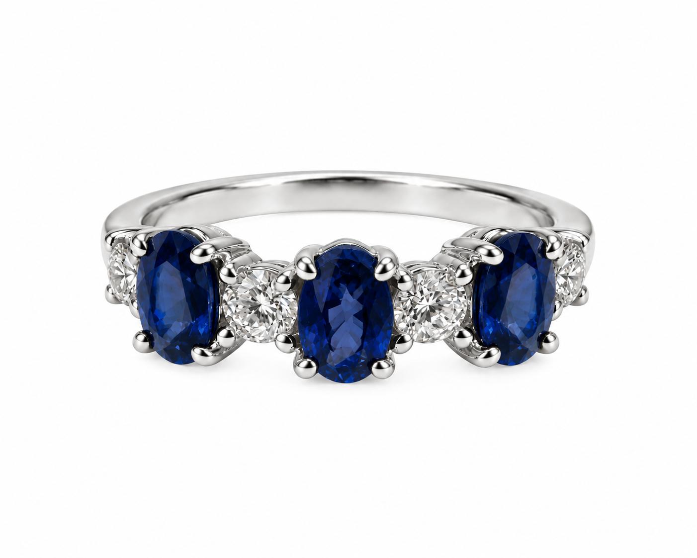 Shown in 14K White Gold with Blue Sapphire